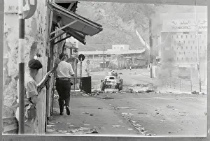 Aden Prints: Soldier and Armored Vehicle Patrolling Aden