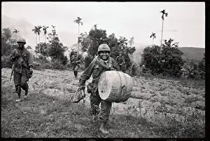 Chu Lai Prints: Soldier Carrying Drum as Spoils of War