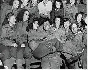 Soldier Carrying a USO Performer