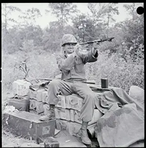 Supply Prints: Soldier Checks Barrel Of M1 Rifle _