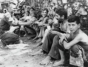 Huty32801 Prints: US Soldier Distributing Rations