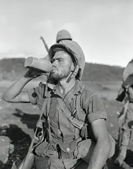 Soldier Drinking From His Canteen