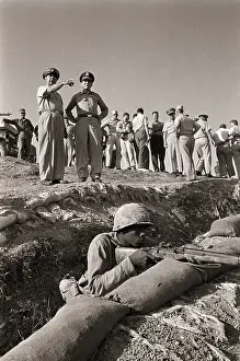 Crisis Prints: Soldier Guarding as Officers Plan Defense