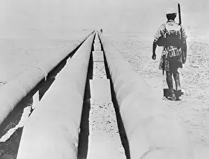 Soldier Guarding Pipeline