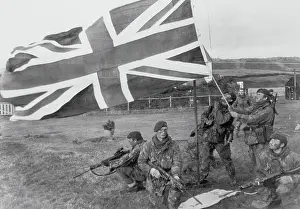 Soldier Hoisting Union Flag