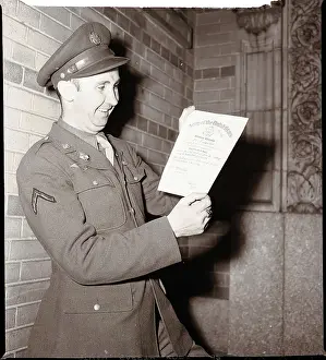 Soldier Holding Discharge Paper