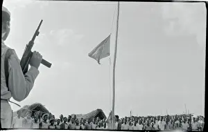 Angola Prints: Soldier Holding Weapon at Encampment