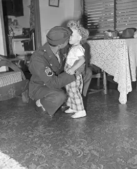 Post War Prints: Soldier Hugs Daughter in Living Room