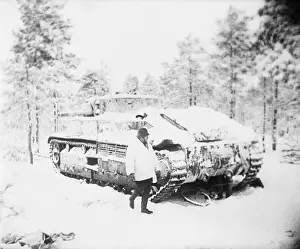 Finland Prints: Soldier Inspecting Captured Soviet Tank