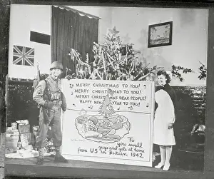 US Soldier with Large Holiday Card While Overseas
