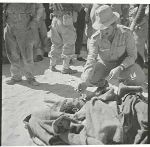 Soldier Lighting Cigarette for Wounded