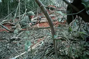 US Soldier Lying Down with Gun