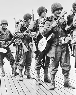 Invasion Prints: Soldier Marching With Guitar