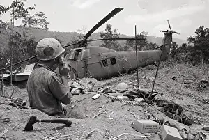 Wreckage Prints: Soldier with Radio near Downed Helicopter