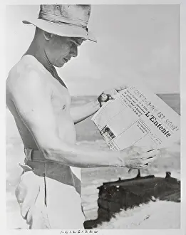 Hanoi Prints: Soldier Reading a Newspaper