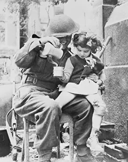 Soldier Sharing Soup with Young Girl