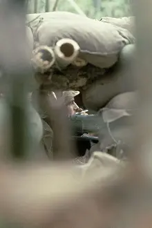 US Soldier Smoking a Cigarette Outside