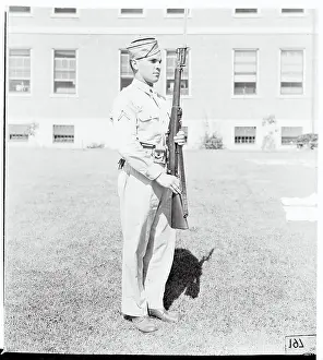 Soldier Standing at Attention With Rifle
