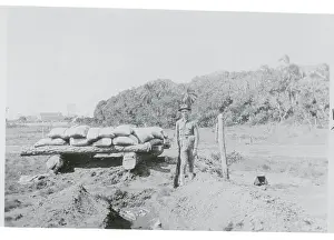 Soldier Standing Guard in Rural Area