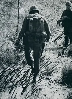 Vietcong Prints: Soldier Stepping Through Punji Trap
