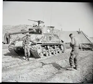 Taking Prints: Soldier Takes Another'S Picture By Tank