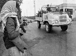Soldier Watching United Nations Jeep