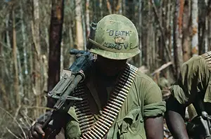 US Soldier Wearing Helmet with Message
