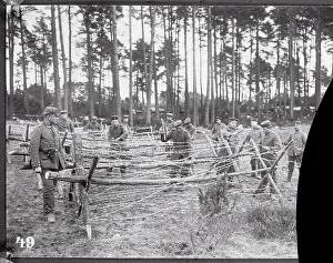 Soldiers Assembling Barbed Wire