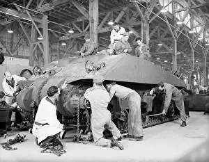 Assembling Prints: Soldiers Assembling a Tank