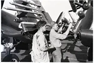 Soldiers Attach Fuze To A Rocket