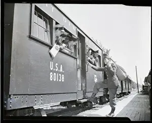 Discharge Prints: Soldiers Boards Train To Leave Army
