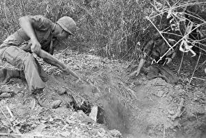 Tunnel Prints: Two Soldiers Burying Vietcong Tunnel