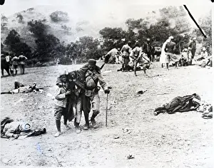 Invasion Prints: Soldiers Carry Wounded Algerian Rifleman