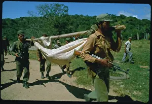 Soldiers Carrying Wounded Comrade