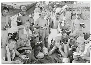 Soldiers Eating Watermelon Together