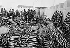 East Pakistan Prints: Soldiers Examine Captured Weapons