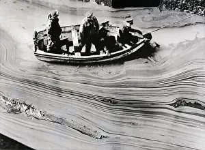 Soldiers And Firemen In A Small Boat