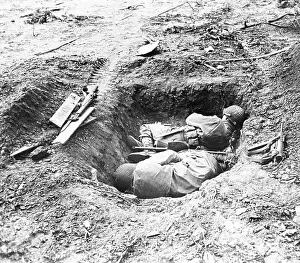 Soldiers Huddling in Foxhole