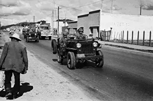 Da Nang Prints: Soldiers in Jeeps Patrolling Street