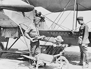 Soldiers Loading Bombs onto Plane
