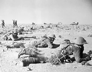 Soldiers Lying in Position with Weapons