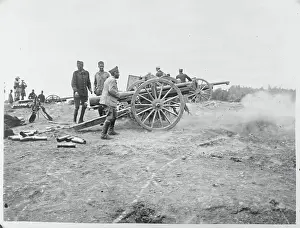 Soldiers Manning Cannon