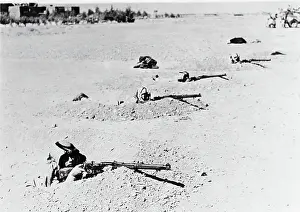 Soldiers Manning Rifle Pits