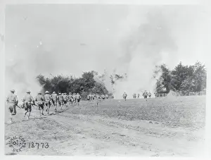 Soldiers Marching Across a Field