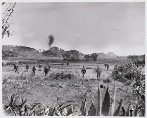 Soldiers Marching Across Field