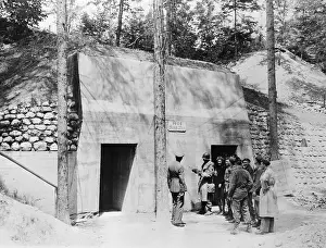 Soldiers Outside Cave Containing Stolen Treasures