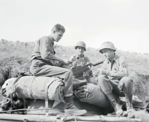 US Soldiers Playing Cards During Break in Fighting
