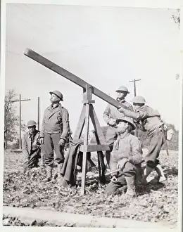 Aiming Prints: Soldiers Practicing with Wooden Gun