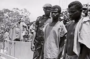 Zaire Prints: Soldiers and Prisoner Inside Stadium for Ridicule