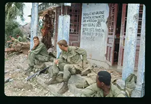 Quang Tri Prints: Soldiers Resting in Front of a Building